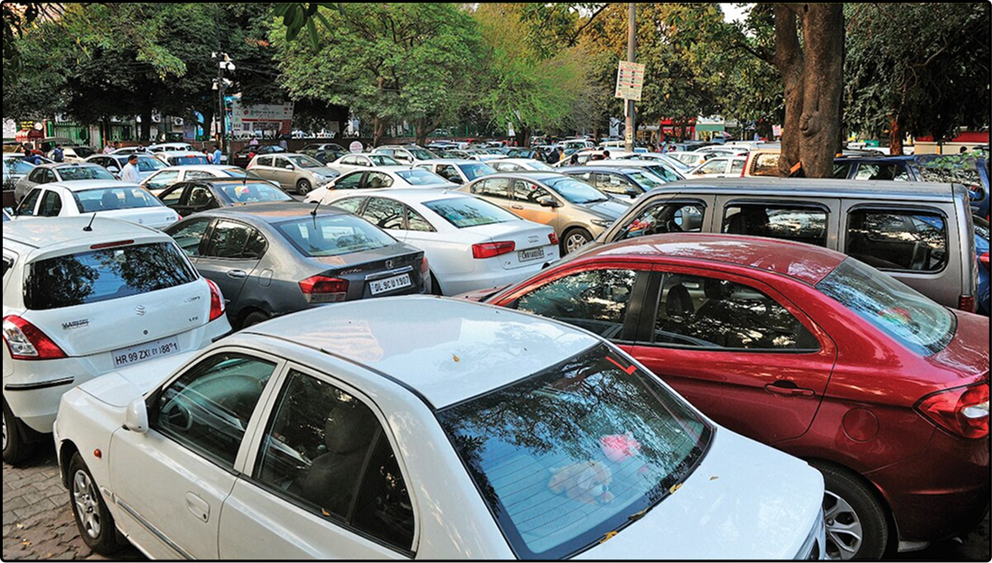 Crowded Delhi parking lot packed with cars