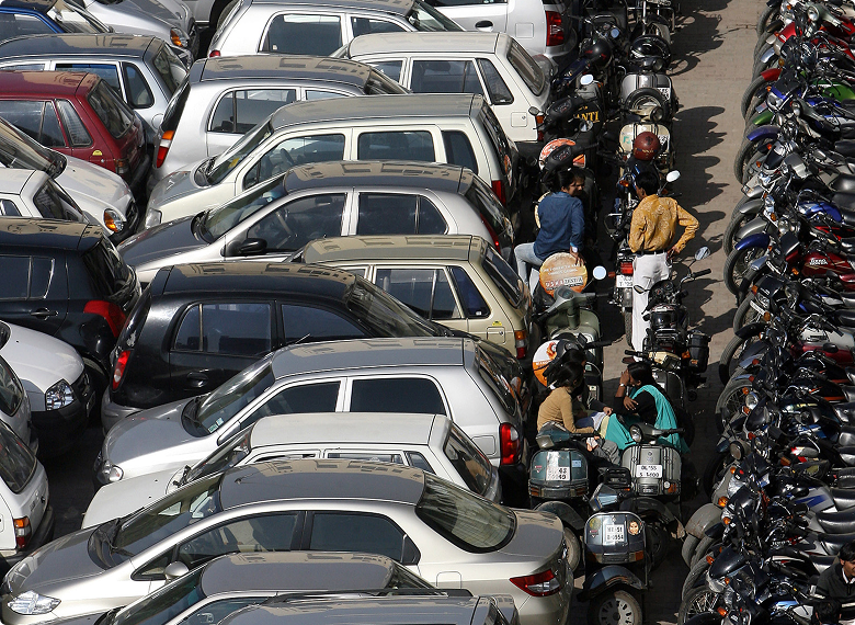 Delhi street congested with parked cars